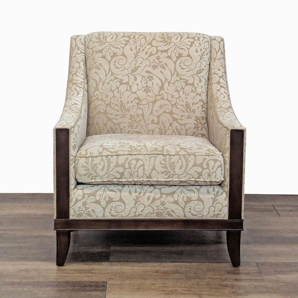 Lounge chair with floral upholstery, dark wood trim, and legs by Kravet Furniture.