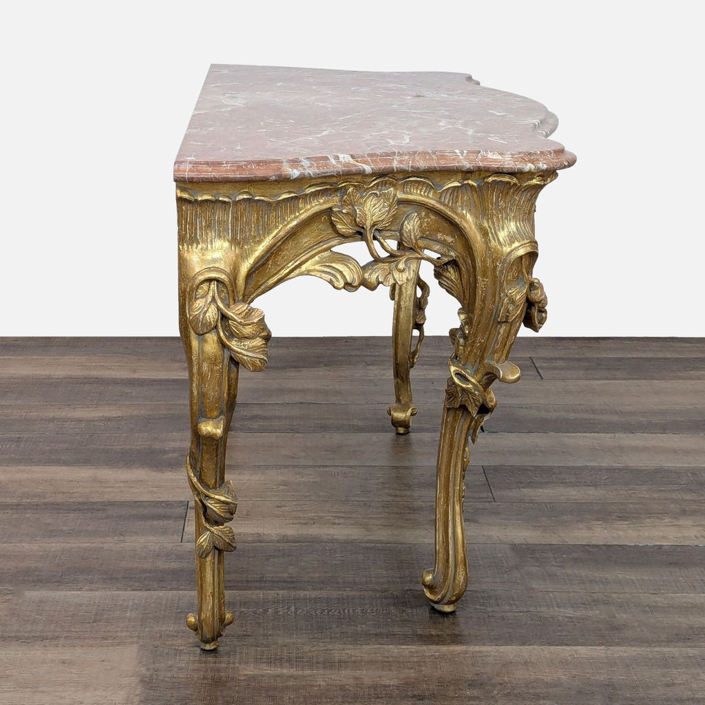 William Switzer Rococo table featuring detailed carved legs and marble top.