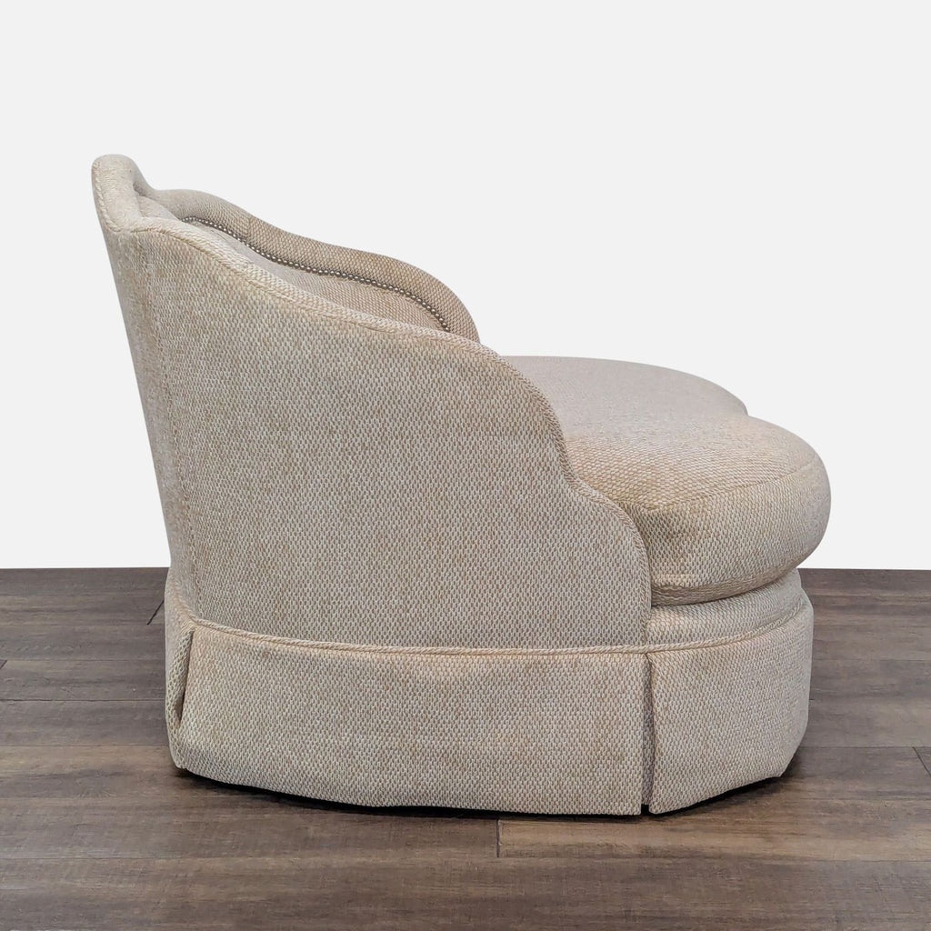 Century Furniture lounge chair with distinct scalloped edges and a swivel base.