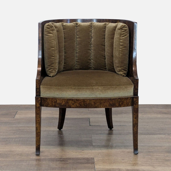1. Front view of a William Switzer lounge chair with burlwood veneer frame and channel tufted velvet back cushion.