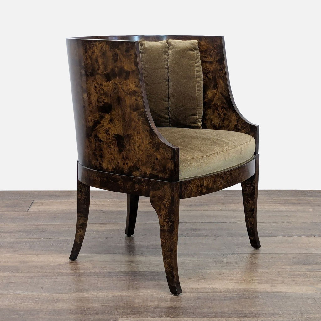 2. Angled side view of a William Switzer lounge chair, featuring a burlwood frame and velvet channel tufted cushion.