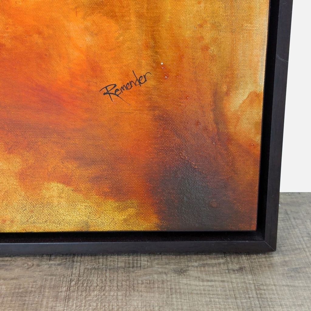 Close-up view of abstract painting, highlighting vibrant orange and red swirls.