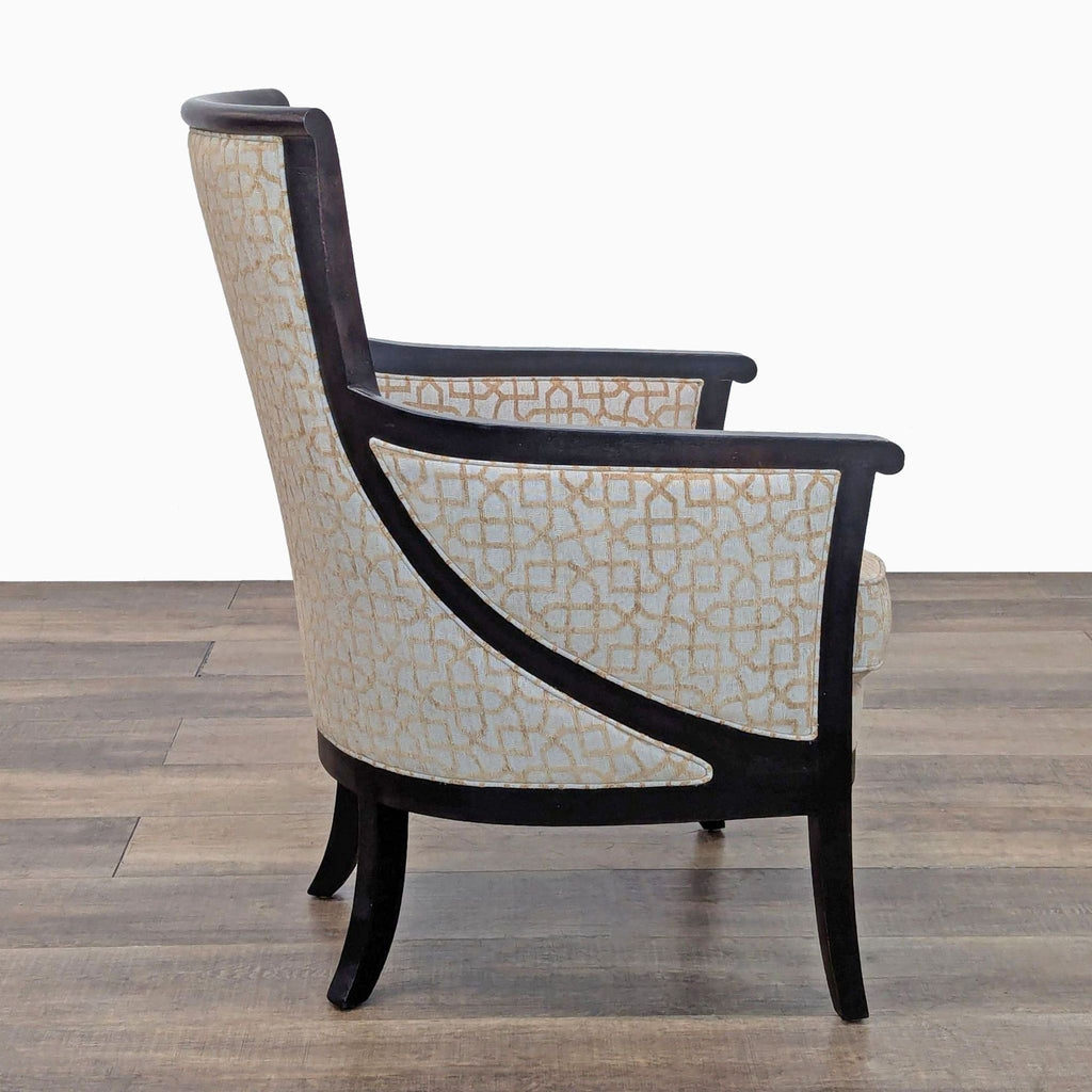 Side view of a lounge chair showing a wooden frame and patterned upholstery.
