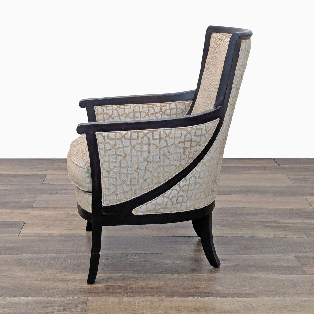 Elegant side angle of a patterned lounge chair with dark wooden accents.