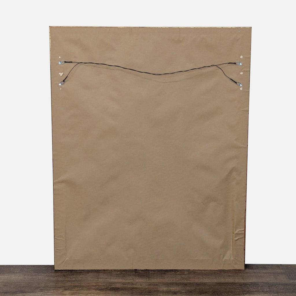 Back view of the art print's frame by Simon Addyman, showing the hanging wire setup.