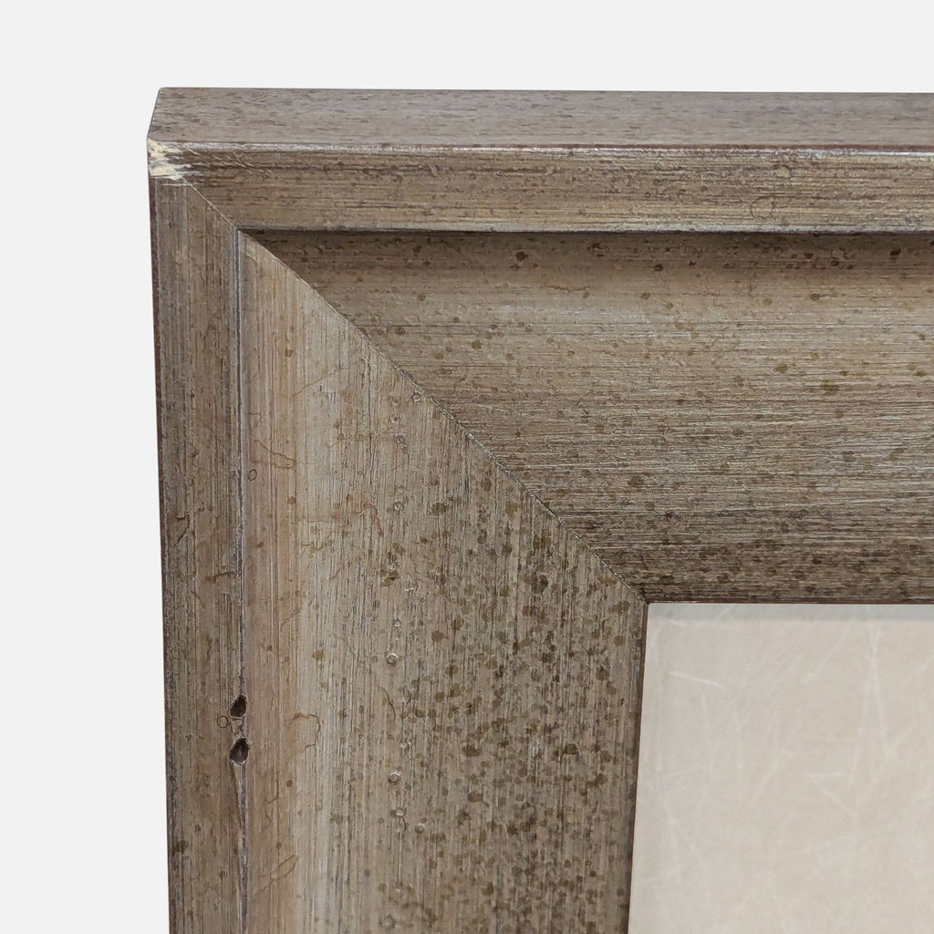 Detailed view of the custom wooden frame.