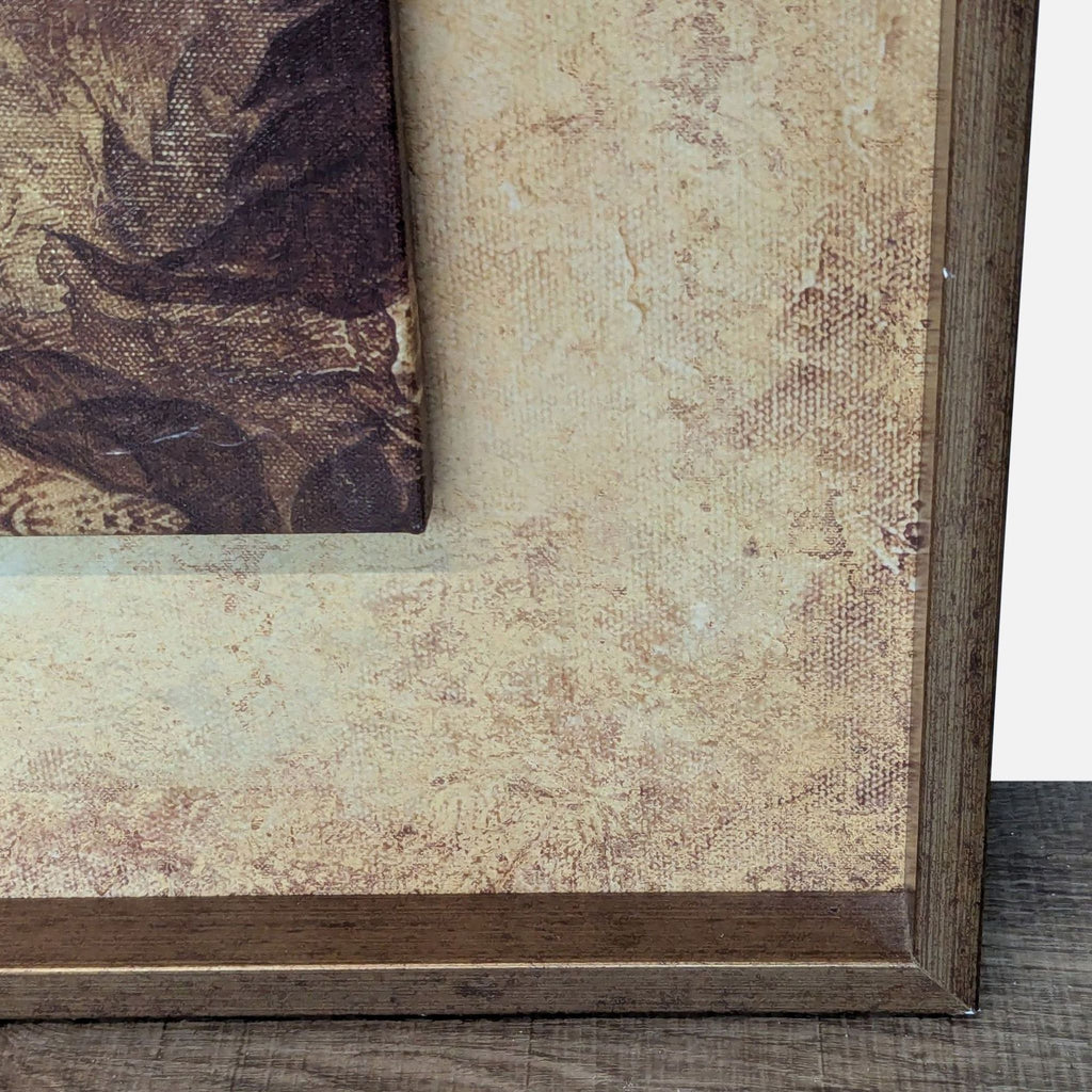 Close-up of canvas texture with warm earthy tones and a wooden frame.