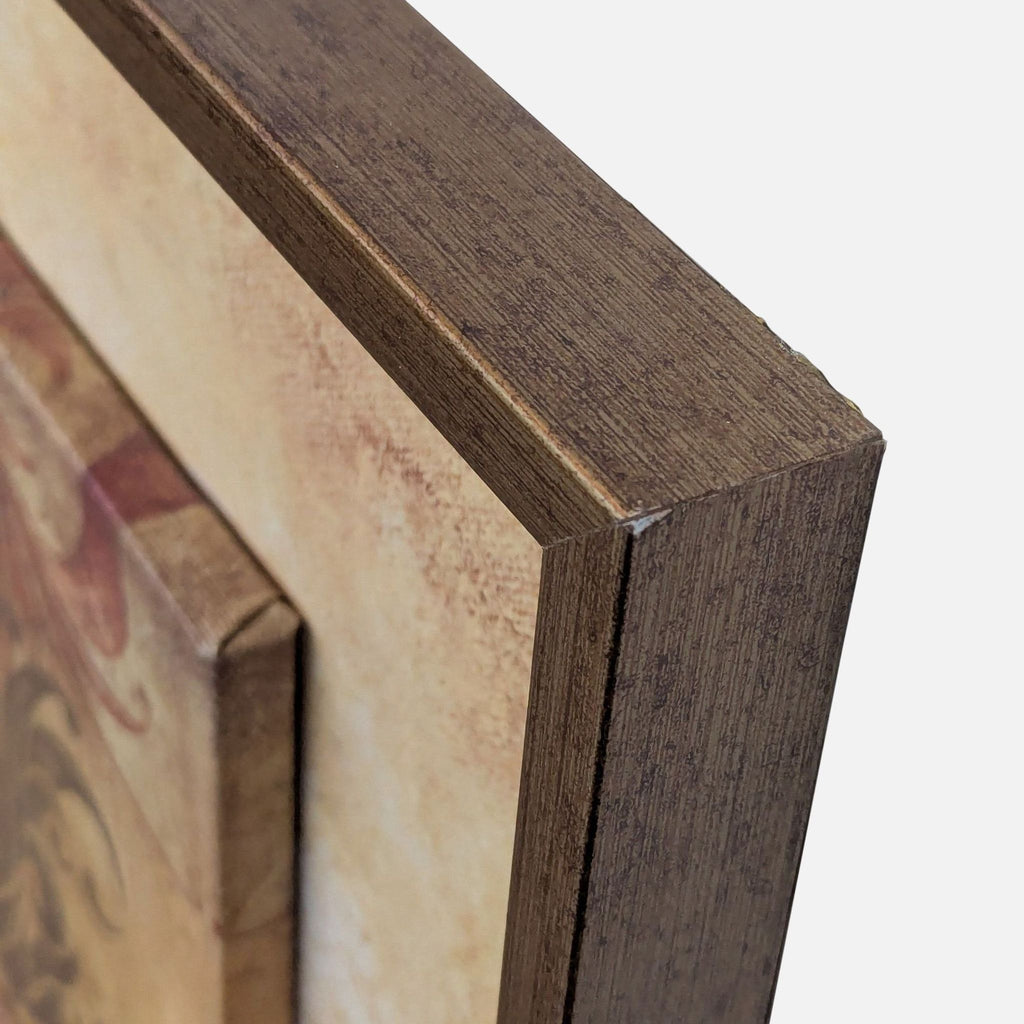 Detailed view of wooden frame's corner and textured canvas edging.