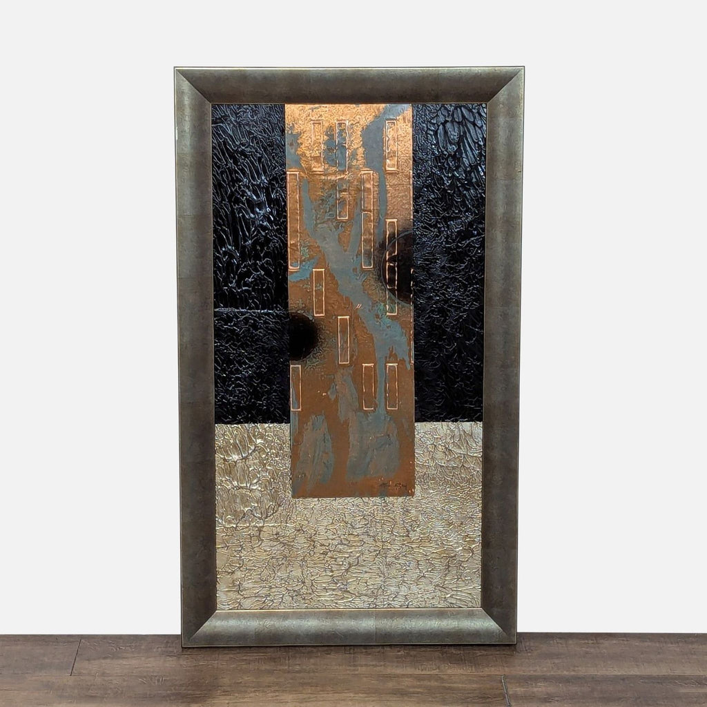 Framed abstract painting with textured black, copper, and beige elements.