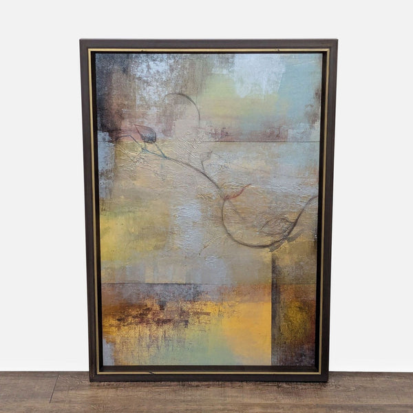 Framed abstract artwork on canvas with subdued colors and delicate textures.