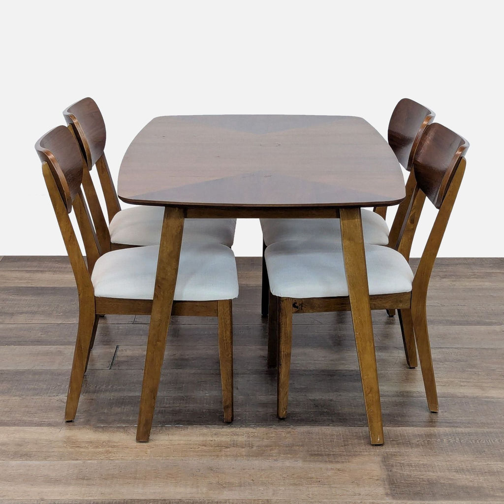 Reperch dining set featuring four chairs and a stylish wooden table.