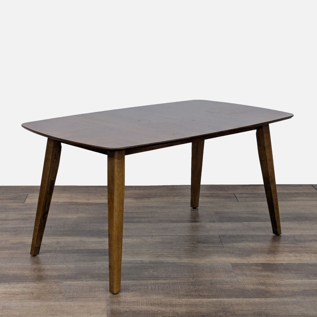 Sleek wooden table with mid-century modern design from Reperch dining set.