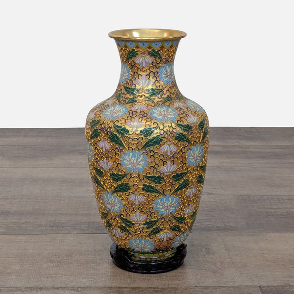 Champlevé vase with carved metal design, featuring intricate incised patterns and vibrant enamel colors.  