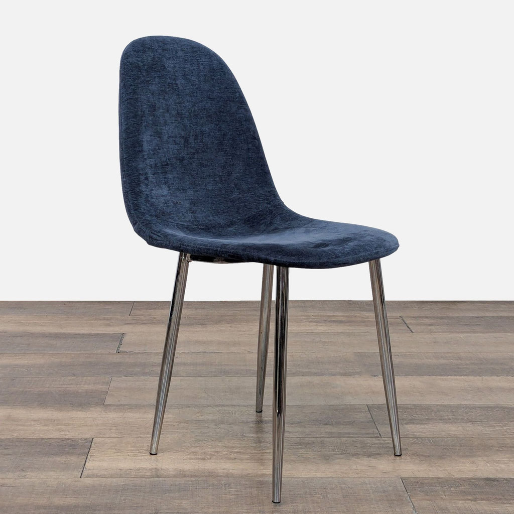 Side angle of a Reperch dining chair featuring a sleek blue seat and shiny metal legs.