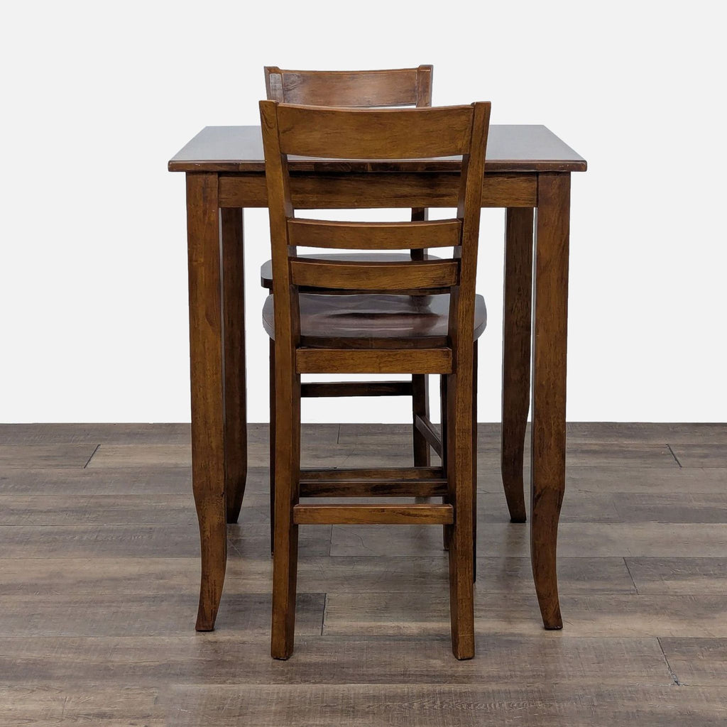 World Market dining set featuring a square table and two barstools.  