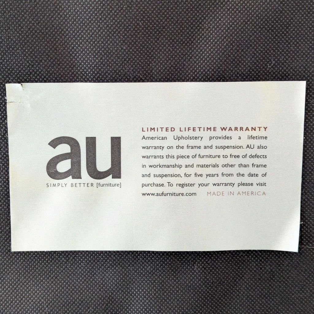 AU brand warranty card for a piece in Stools, Ottomans & Benches.
