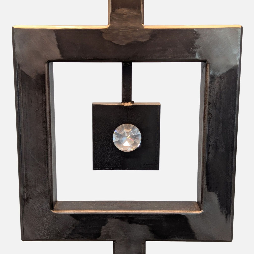 Close-up of geometric design and crystal accent on a Reperch floor lamp for modern home decor.