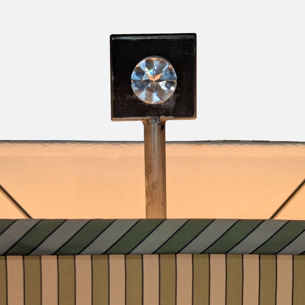 Detailed view of top crystal accent on a Reperch geometric floor lamp, perfect for stylish interiors.