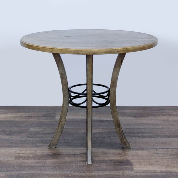 Reperch round dining table with metal legs and wood top, viewed from the front.  