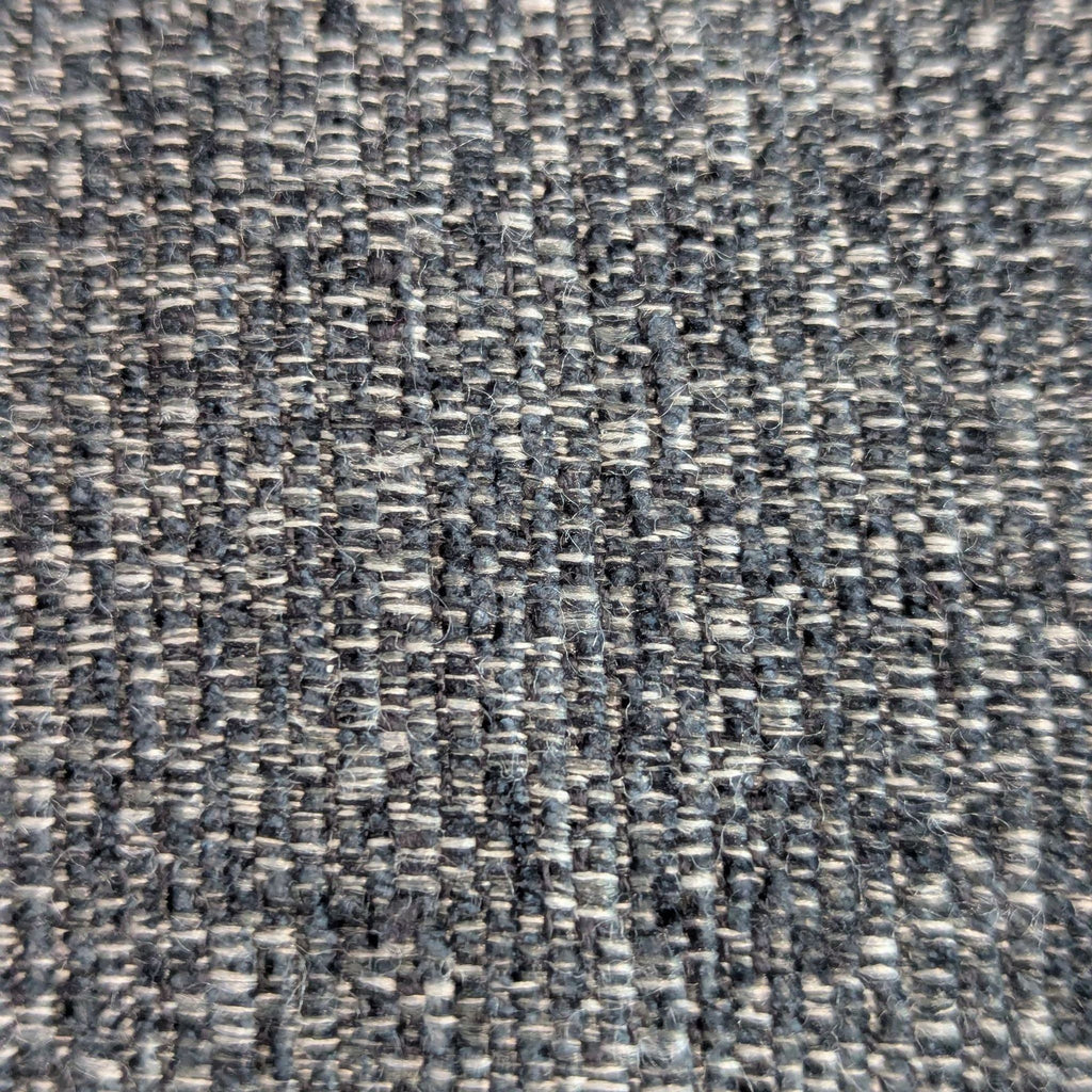 Close-up of textured upholstery fabric on a modular sectional by Juanillo Furniture.