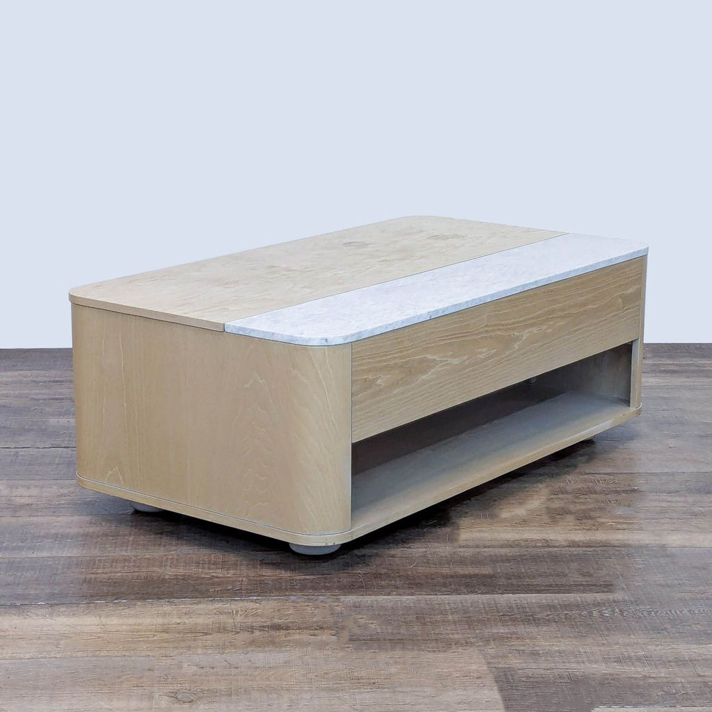 Oak coffee table with marble slab and storage space.