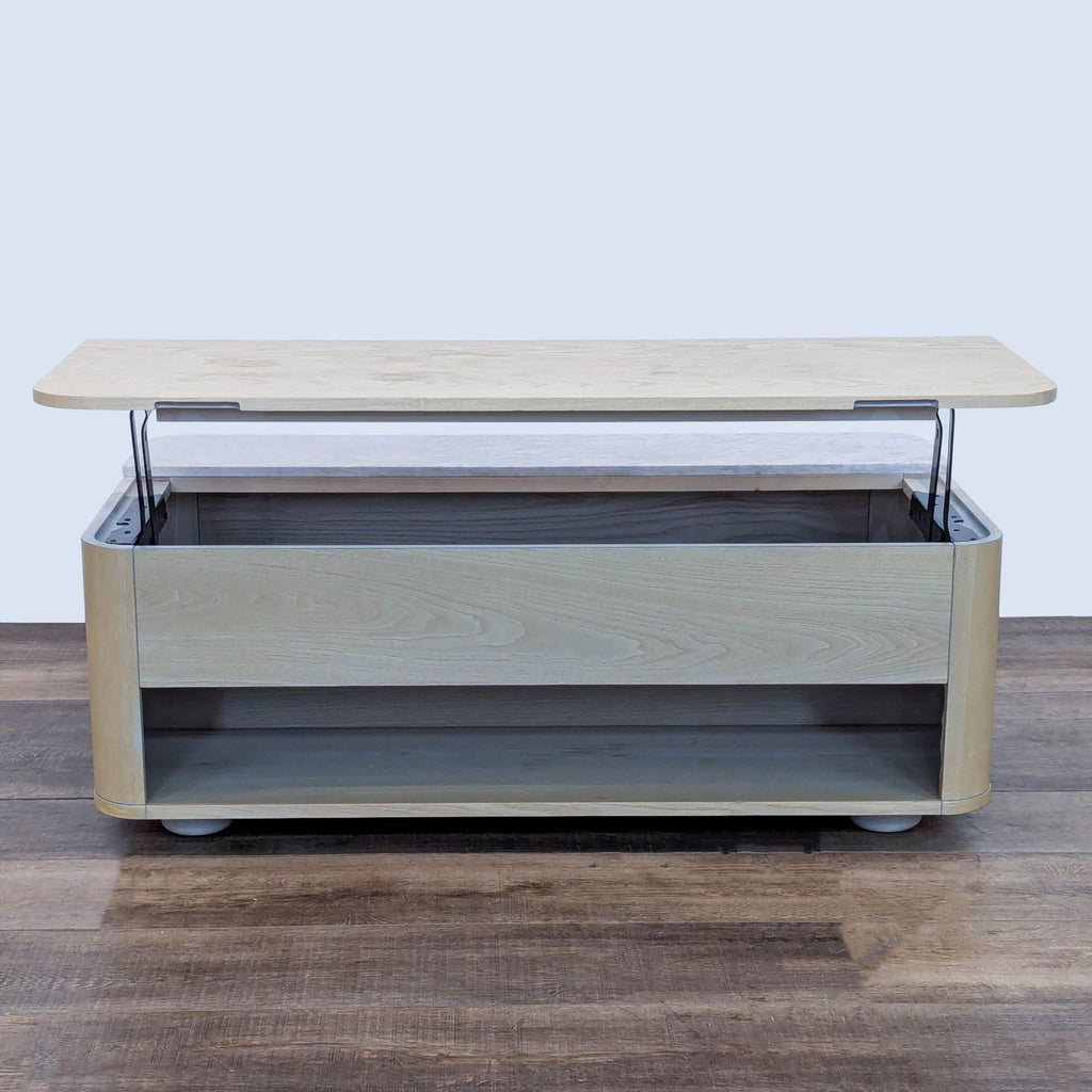 Pop-up top coffee table revealing interior storage.