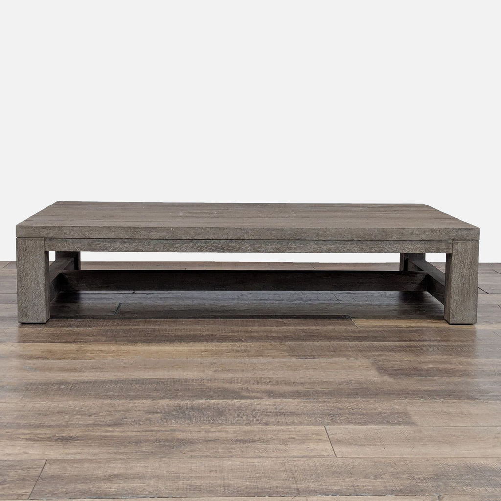 Rectangular teak table by Restoration Hardware with a weathered finish.