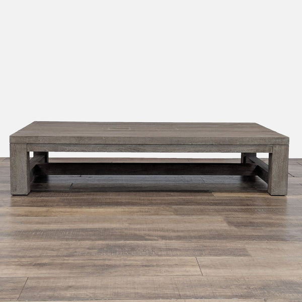 Rectangular teak table by Restoration Hardware with a weathered finish.