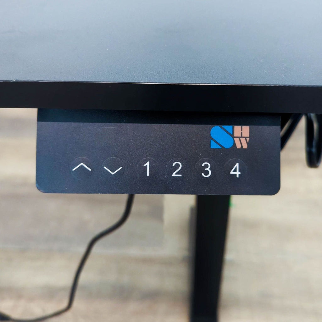 Close-up of SHW desk memory presets panel with numbers 1 to 4 and arrows.