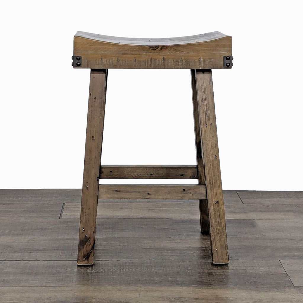 Reclaimed pine and rubberwood stool with a rustic finish, by Emerald Home.
