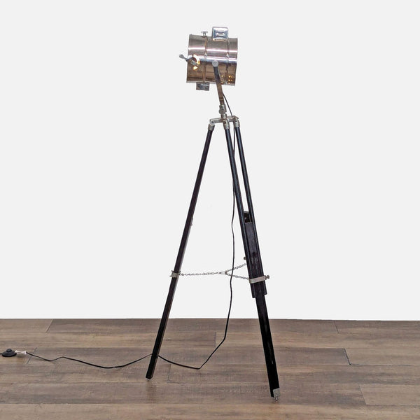 Wood tripod studio light from Reperch with adjustable height.