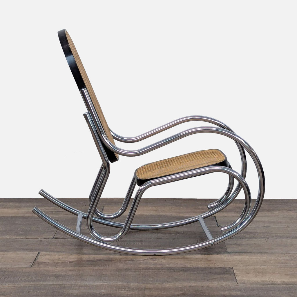 Side view of vintage rocking chair featuring chrome steel frame and rattan details.