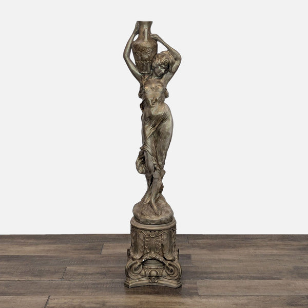 Elegant stone statue of a woman with urn on head, detailed and suitable for garden decor.