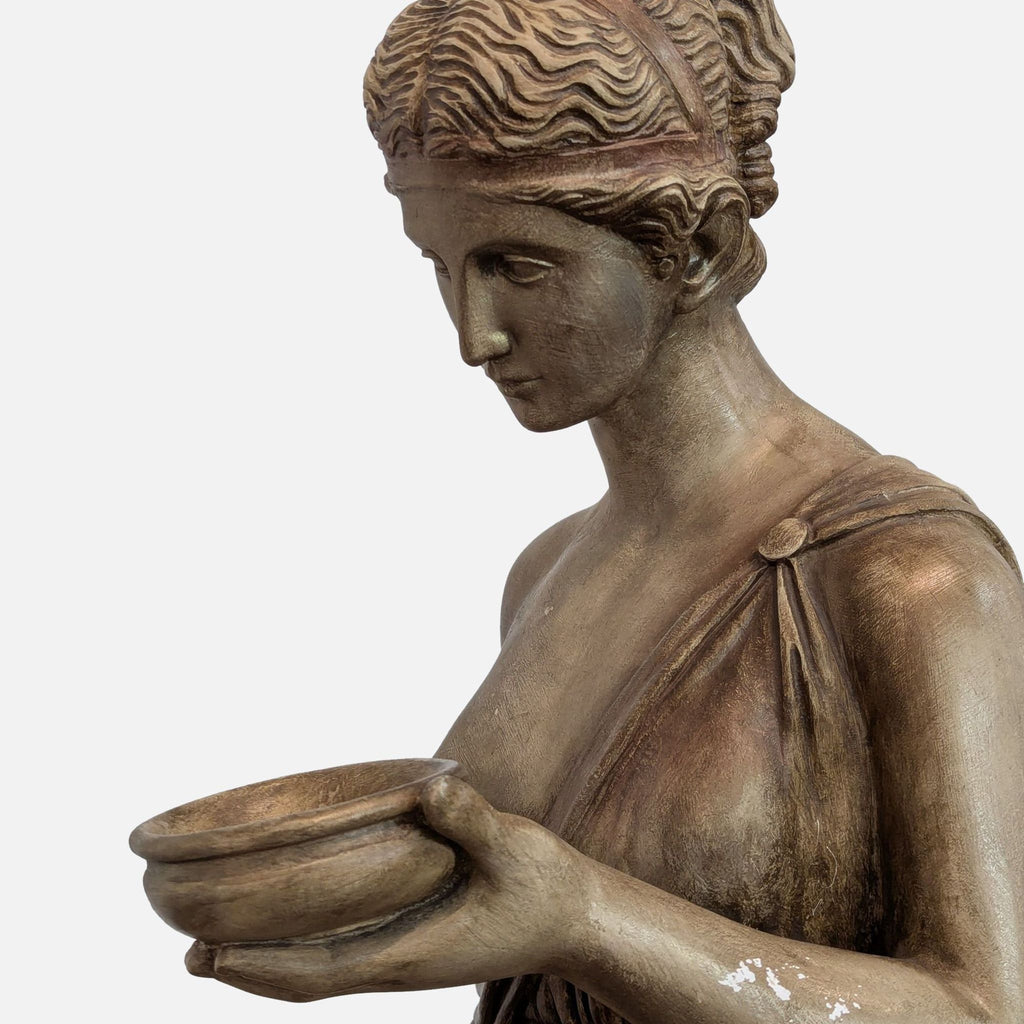 Close-up of Hebe's serene face as she holds a cup, crafted by Florentine Art Studio.