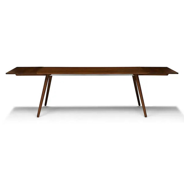 Extendable dining table from Article with solid wood leaves.
