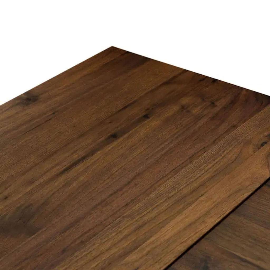 Close-up of wood grain texture on Article dining table leaves.