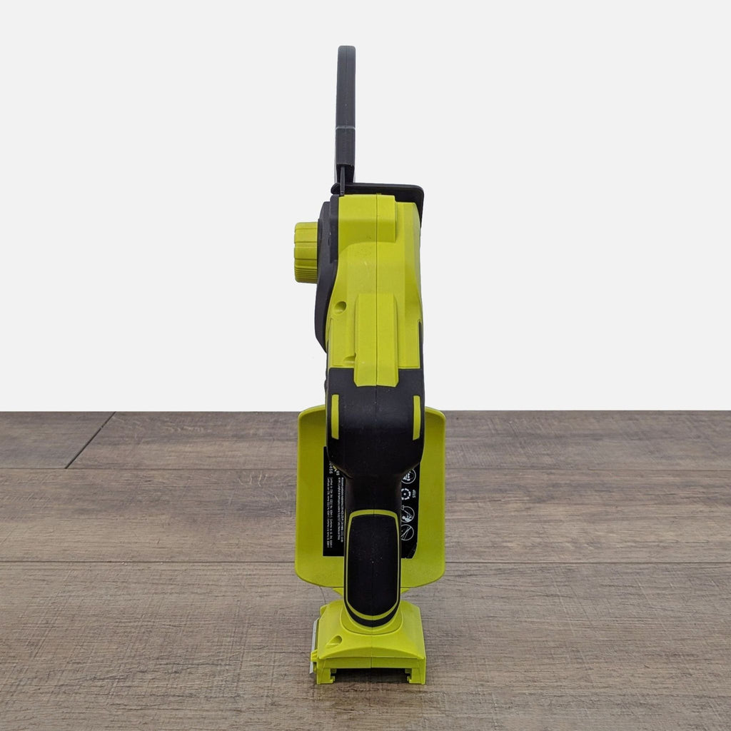 3. Front view of the Sun Joe cordless mini chainsaw, highlighting its ergonomic handle and lightweight construction.