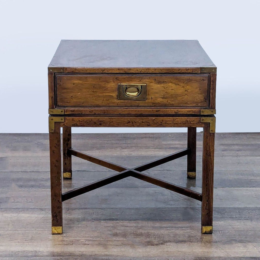 Heritage Furniture end table with brass accents and a closed drawer.  
