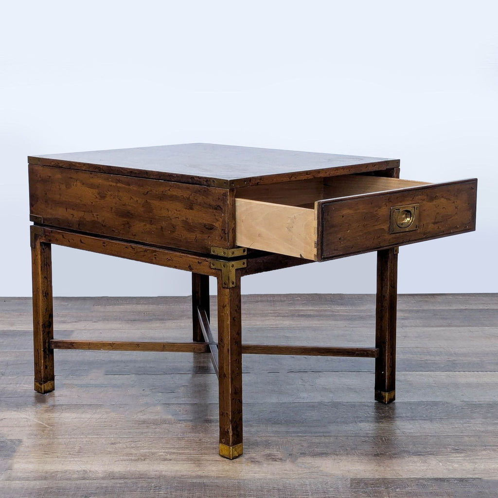 End table by Heritage Furniture featuring an open drawer and crossbar support.  