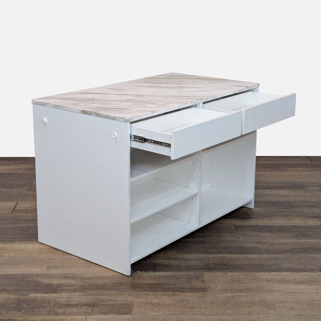 2. Side view of the island showing open drawers and marble overhang for stools.