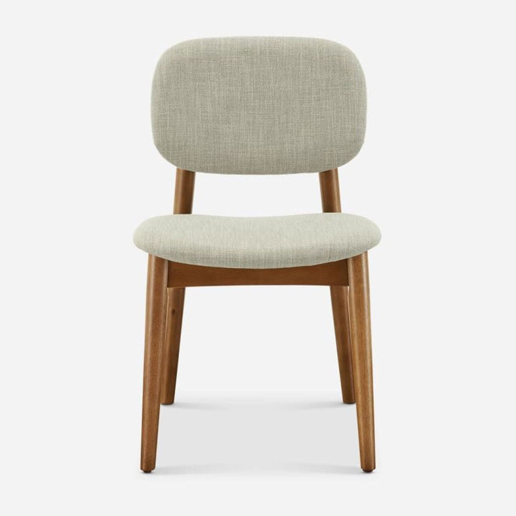 Front view of a dining chair with fabric upholstery and wooden legs.