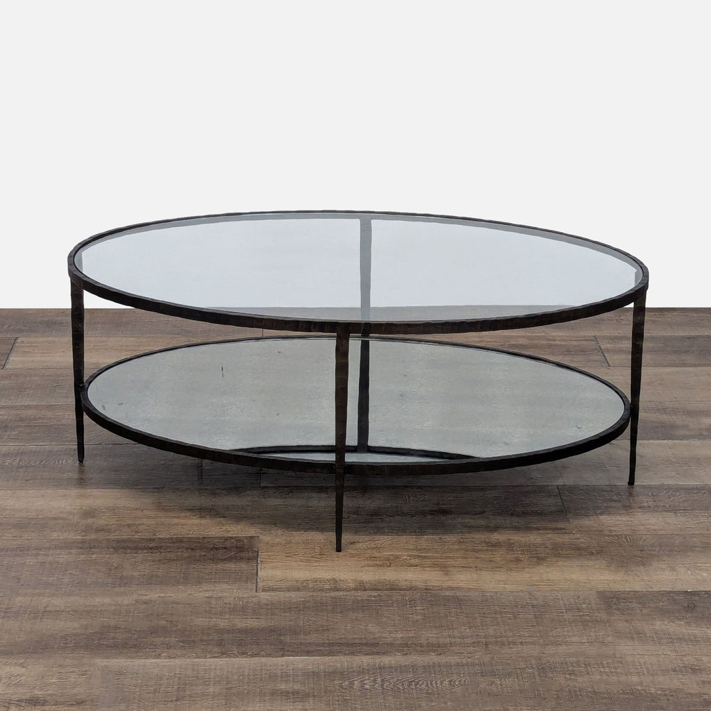 Stylish Reperch table featuring a metal frame and glass surfaces.