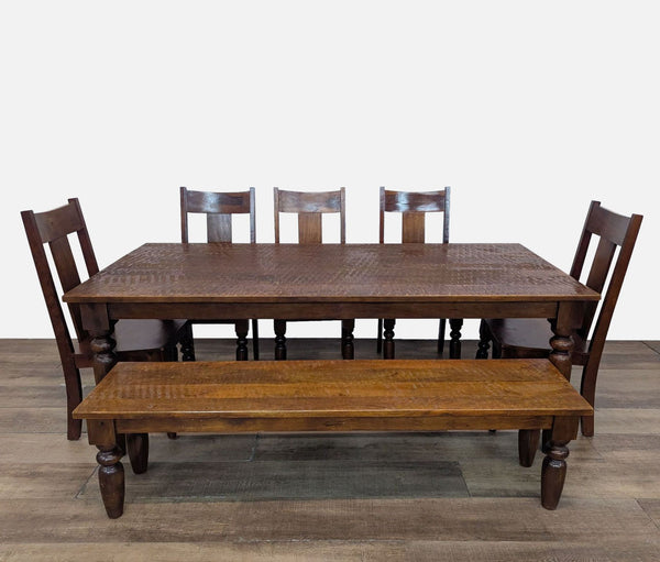 1. World Market solid wood dining set with turned-leg table, bench, and five matching chairs in a classic style.