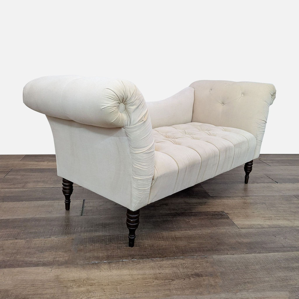 2. Regal Antique White Skyline loveseat with sweeping silhouette, deep tufting, and elegant rolled arms and back.  