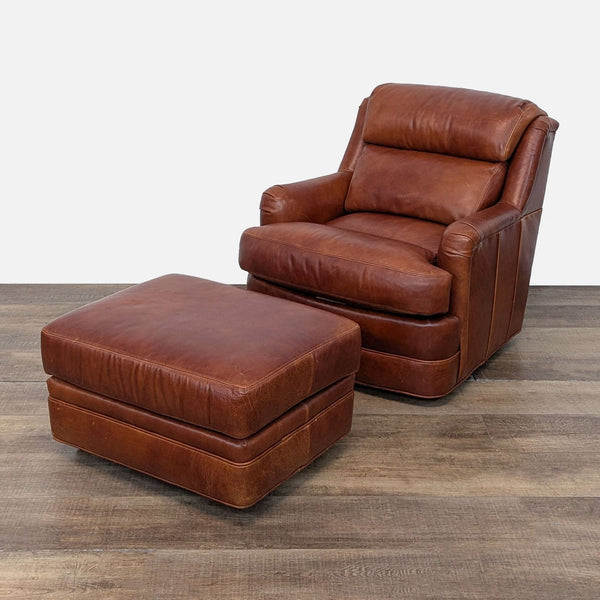 1. Brown genuine leather lounge chair with plush cushions and a matching ottoman on caster wheels by Whittemore-Sherrill.