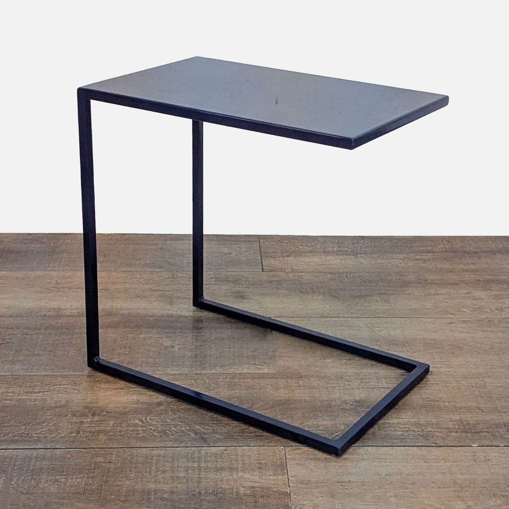 Room & Board indigo side table with a geometric steel frame.