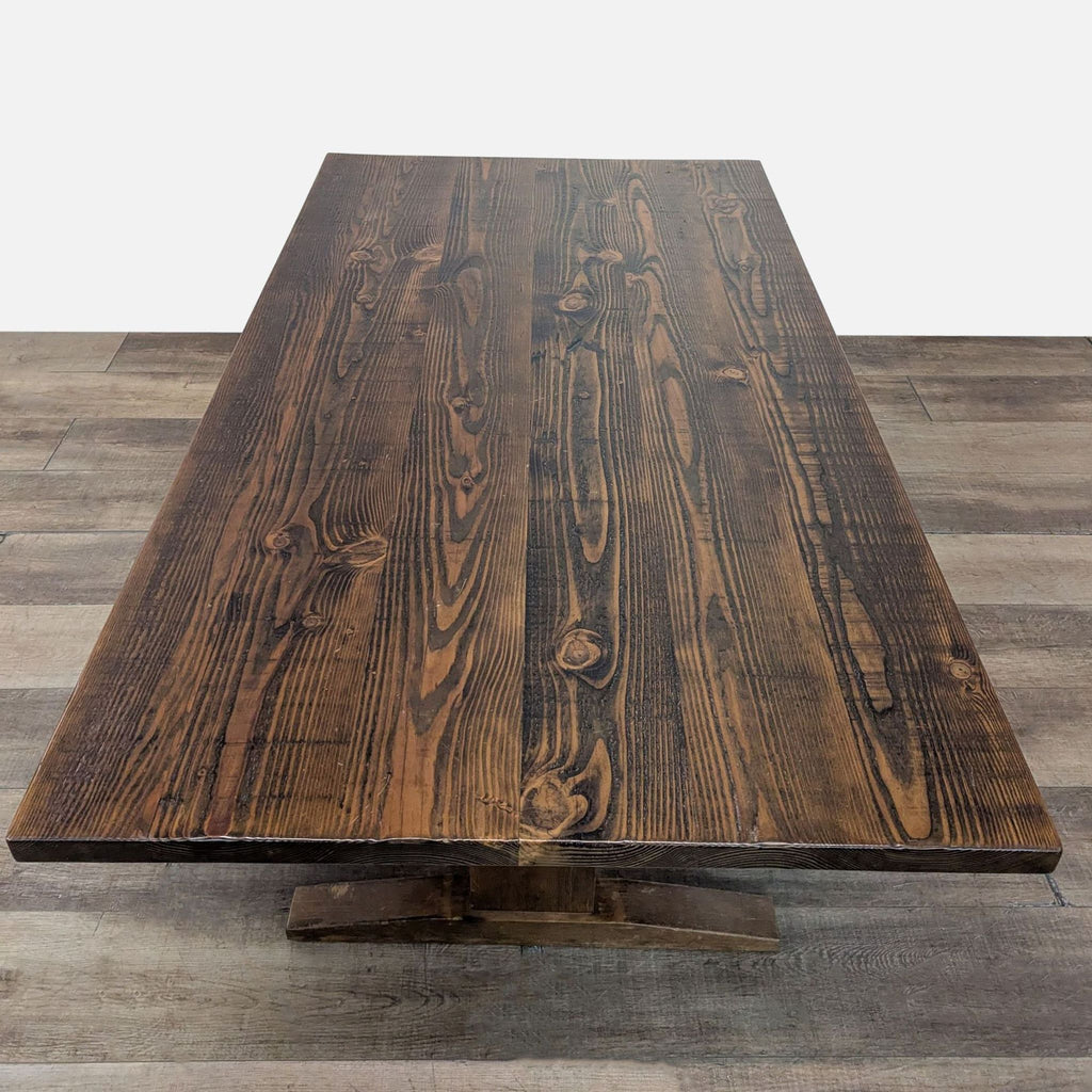 Top view of Reperch dining table showcasing wood grain.