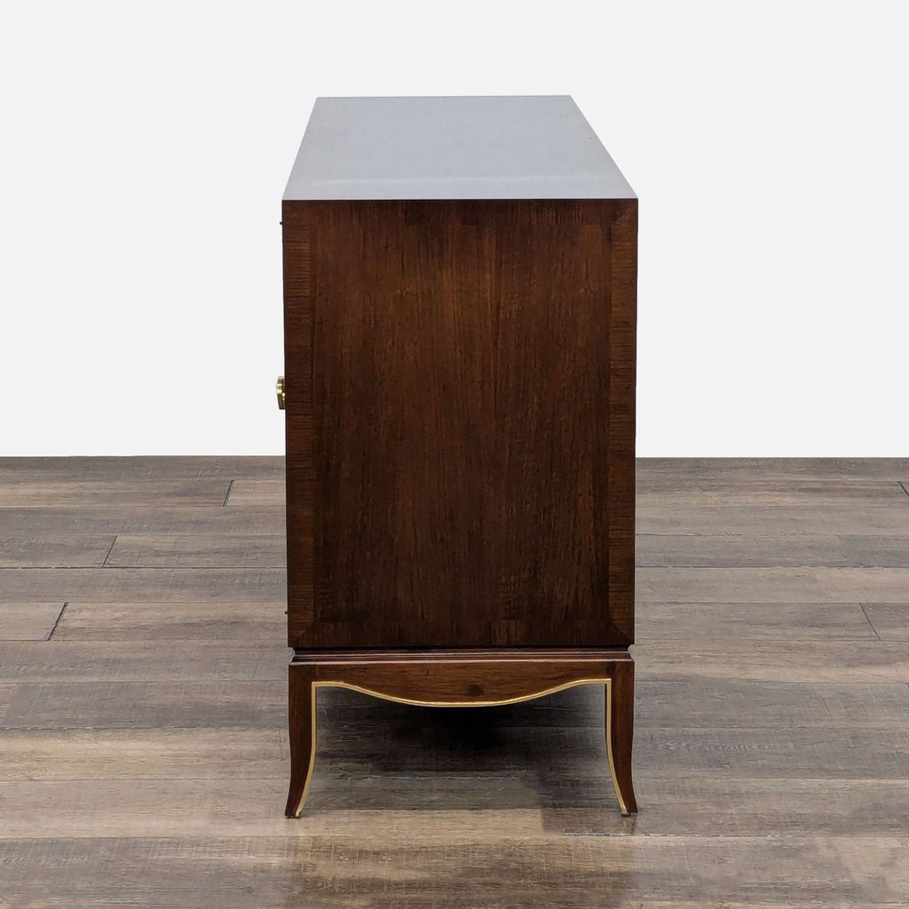 3. Side profile of Reperch mahogany wood dresser, showing solid construction and gold accented base.