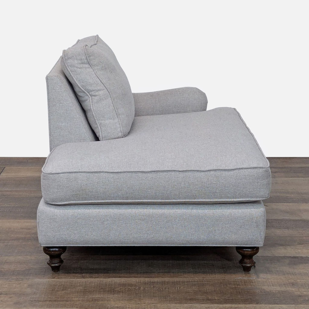 2. Side view of Reperch Lounge chaise, showing right armrest, plush cushions, and classic wood legs.