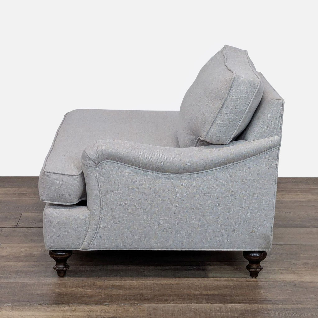 3. Reperch Lounge chaise in light gray, featuring a curved right armrest, removable cushions, and turned legs.